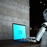 AI robot working on computer. Agentic AI concept