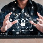 Businessman holding shield protect icon. Protection network security computer and safe your data concept, lock symbol, concept about security, cybersecurity and protection against dangers.