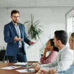 Group of young business people having a meeting or presentation and seminar in the office or culture.