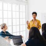 Female leader having a meeting with colleagues