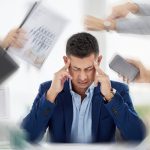 Businessman experiencing stress and anxiety