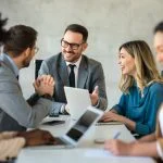 Businessman with emotional intelligence together with successful multiethnic business people working on teamwork meeting in corporate office.