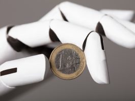 AI bot holding Euro coin. AI in Europe concept