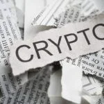 Crypto on newspaper